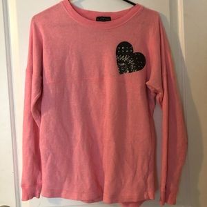 Pink thin sweater with details